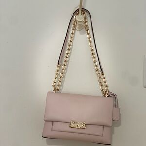 Michael Kors Pink and Gold Crossbody Bag with Elegant Design